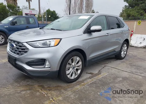 2021 Ford Edge Titanium z USA, uszkodzony, nr VIN 2FMPK4K9XMBA53607